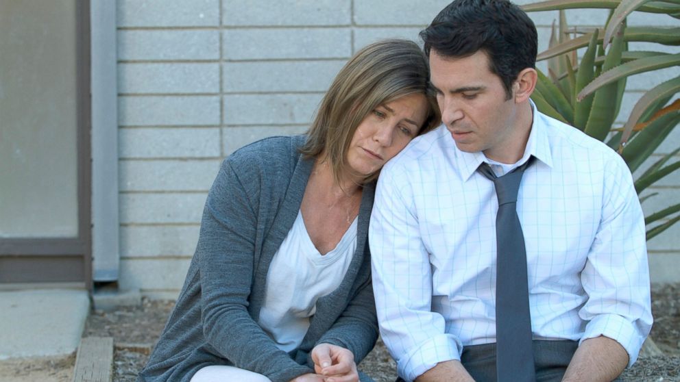 Jennifer Aniston, left, and Chris Messina in a scene from "Cake." 