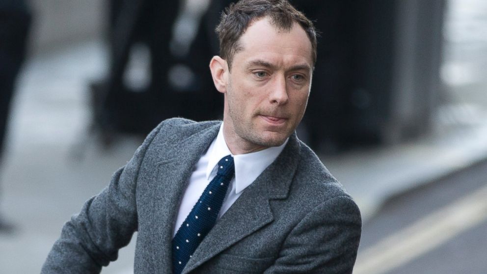 British actor Jude Law arrives at The Old Bailey law court in to give evidence at the phone hacking trial in London, Jan. 27, 2014.