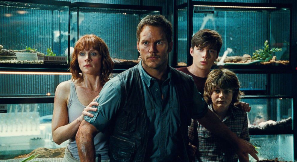 PHOTO: Bryce Dallas Howard, from left, as Claire, Chris Pratt as Owen, Nick Robinson as Zach, and Ty Simpkins as Gray, in a scene from the film, "Jurassic World."