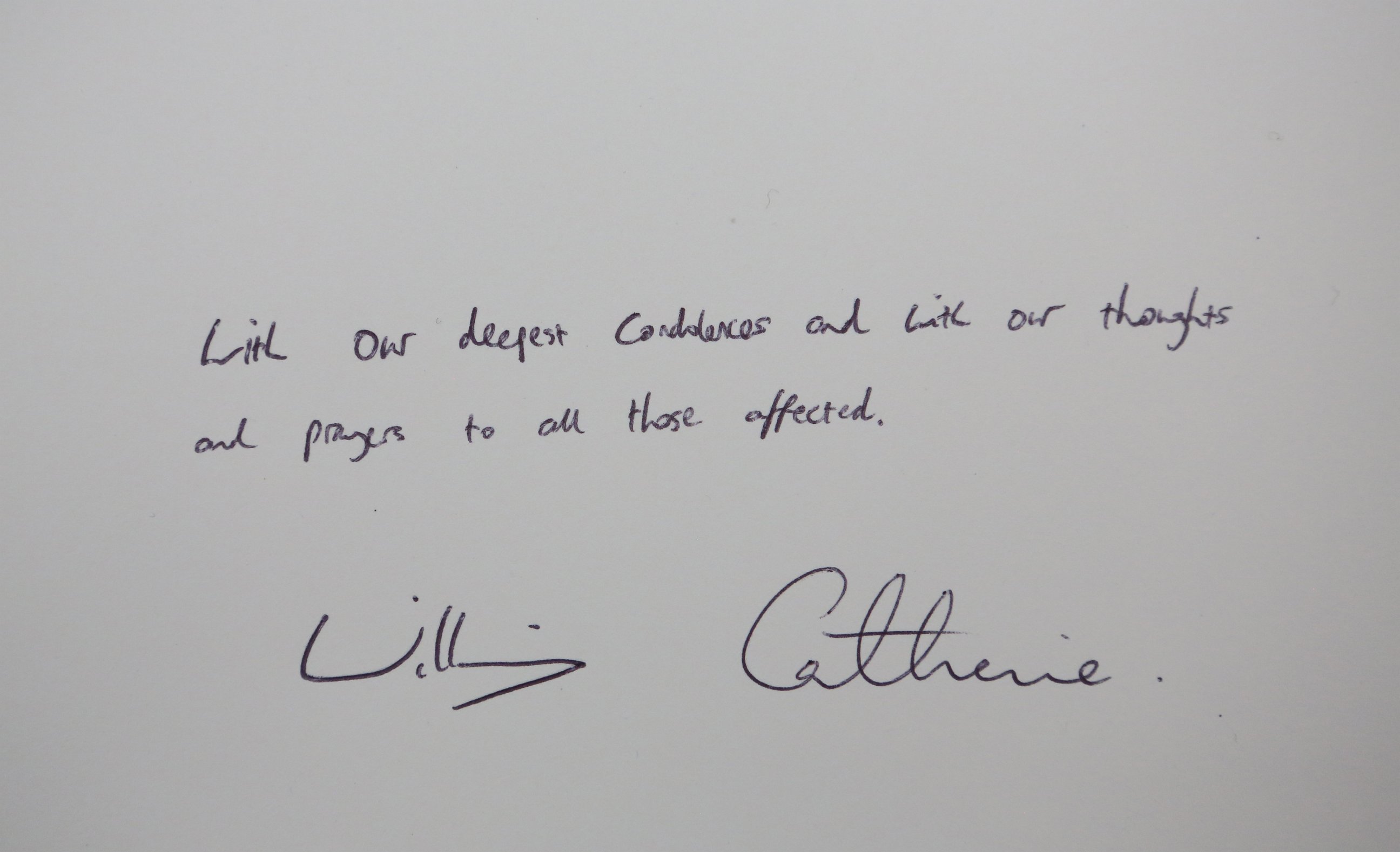 PHOTO: The note left by the Britain's Prince William and Kate Duchess of Cambridge in a book of condolence for the Orlando nightclub shooting victims at the US Embassy in London, June 14, 2016.