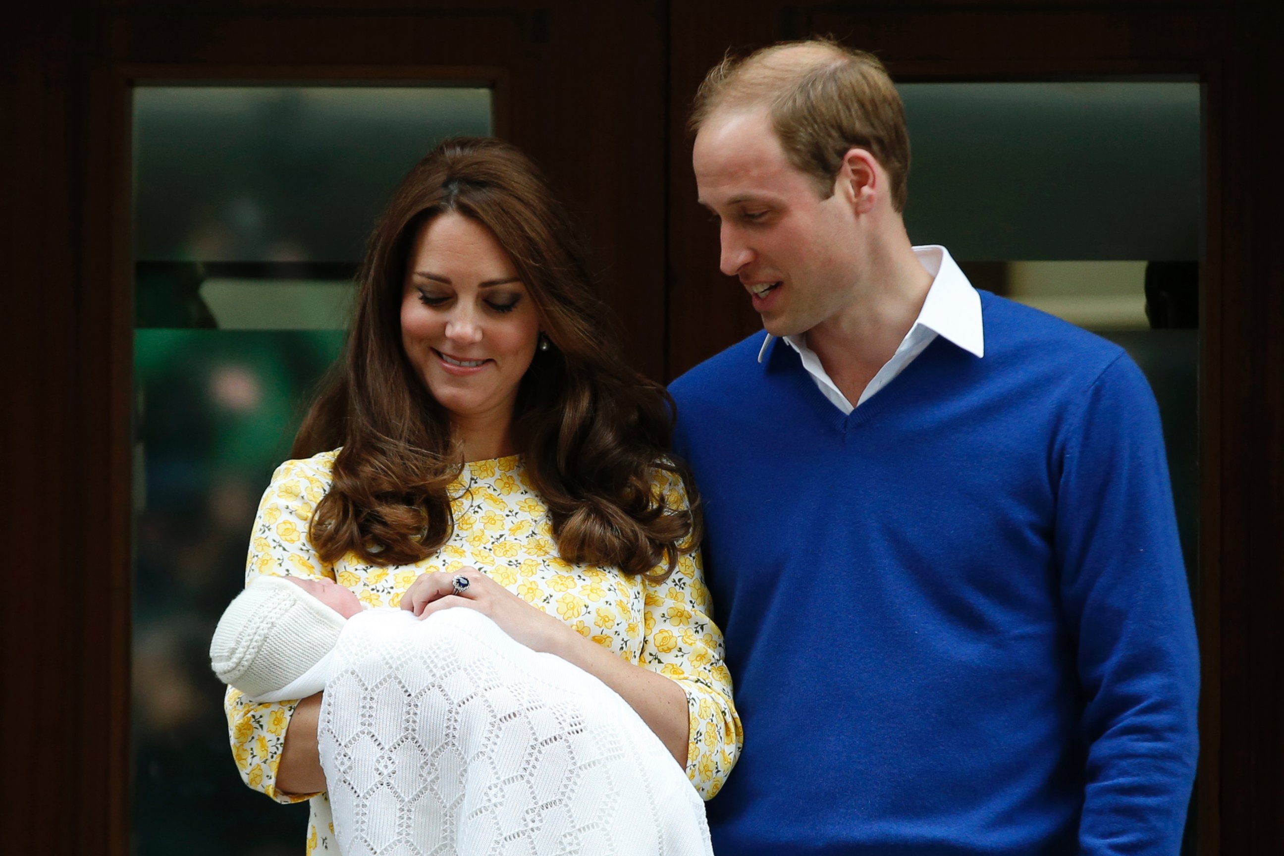 PHOTO: Britain's Prince William, right, and Kate, Duchess of Cambridge, with their newborn daughter pose for the media outside St. Mary's Hospital's exclusive Lindo Wing, London, Saturday, May 2, 2015.