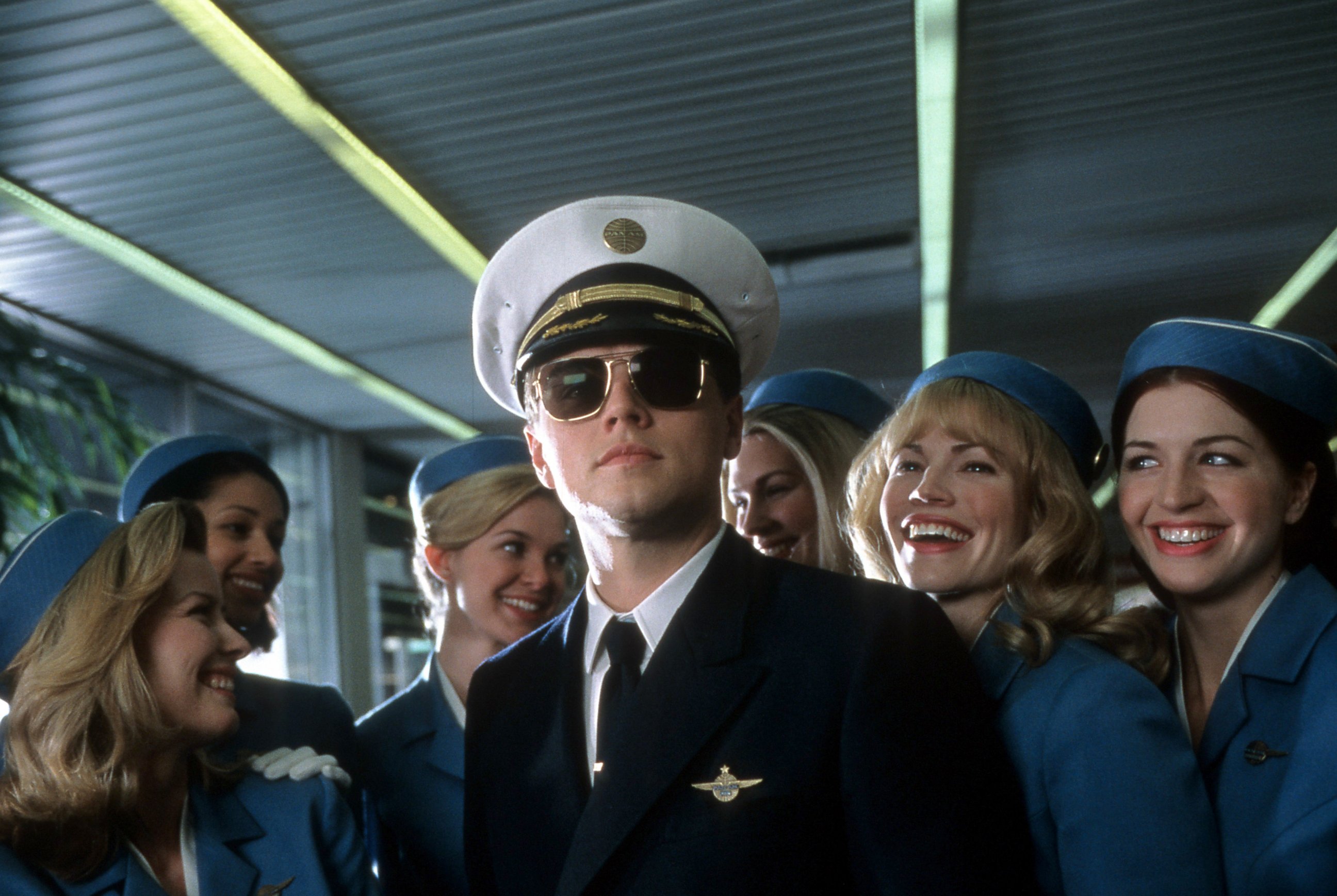 PHOTO: Leonardo DiCaprio with airline stewardess surrounding him in a scene from the film 'Catch Me If You Can', 2002.
