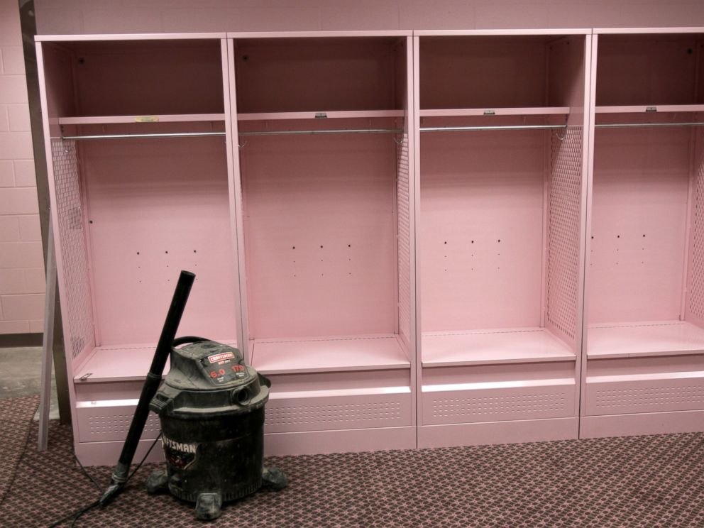 PHOTO: The visiting team field level locker room in Kinnick Stadium at the University of Iowa in Iowa City, Iowa, is seen during a tour, Aug. 20, 2005. The visiting team locker room features pink carpeting, lockers, and bathroom facilities. 