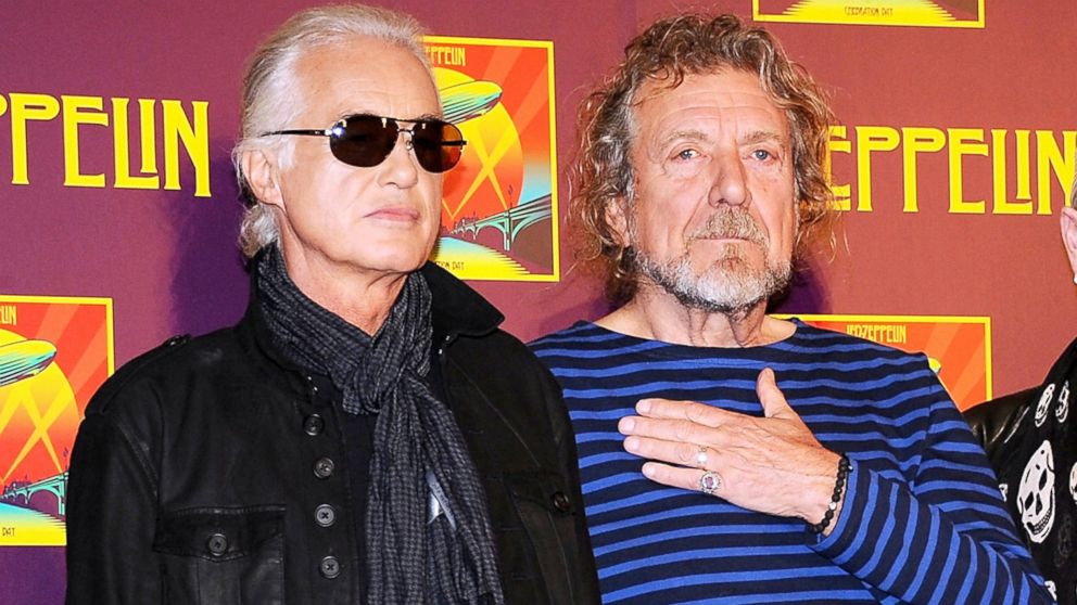 Led Zeppelin guitarist Jimmy Page, left, and singer Robert Plant appear at a press conference.