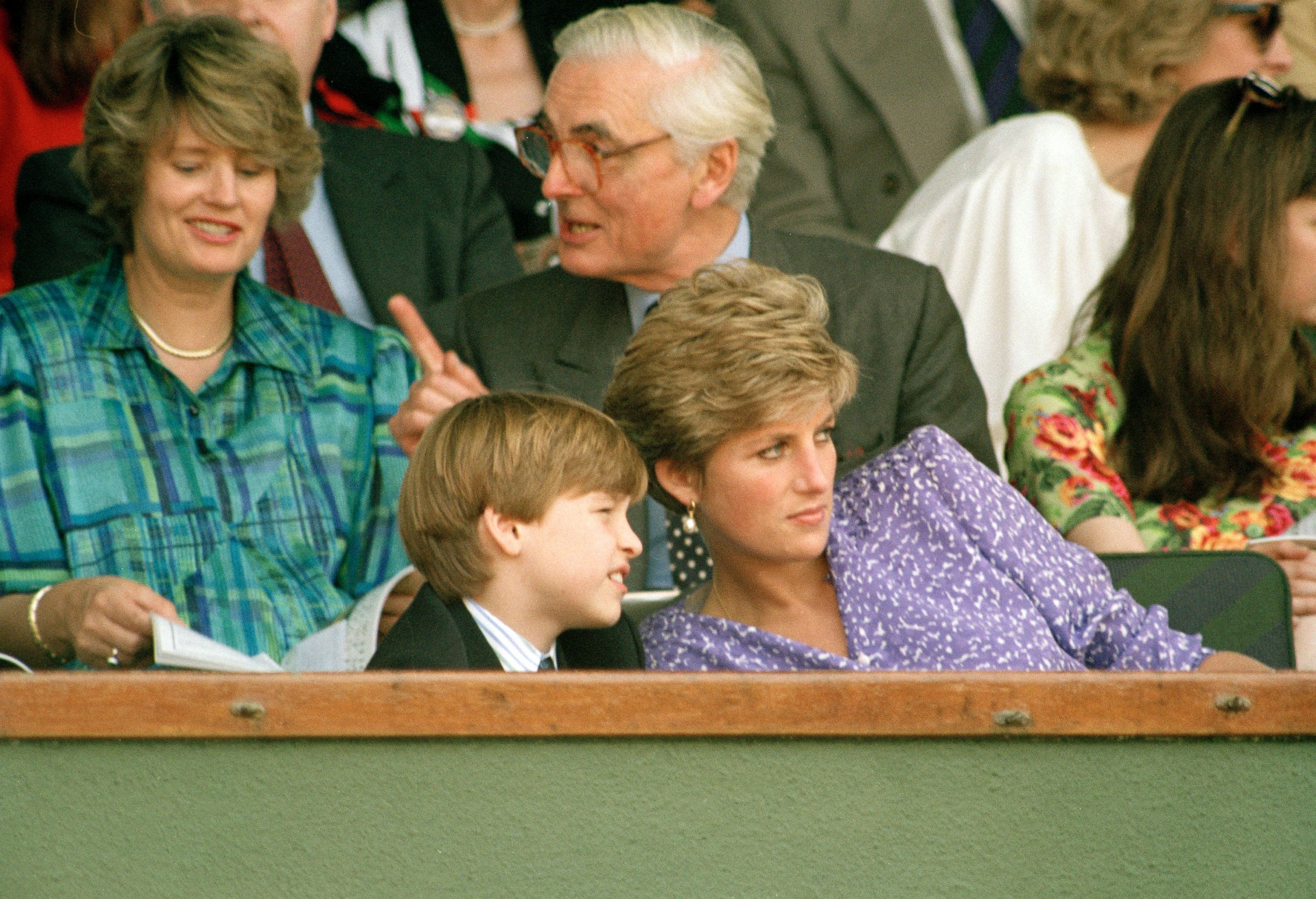 PHOTO: The Princess of Wales explains things to Prince Williams, 9, during his first visit to Wimbledon, July 6, 1991.  