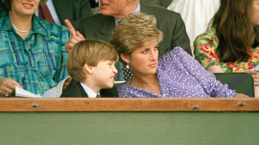 PHOTO: The Princess of Wales explains things to Prince Williams, 9, during his first visit to Wimbledon, July 6, 1991.  