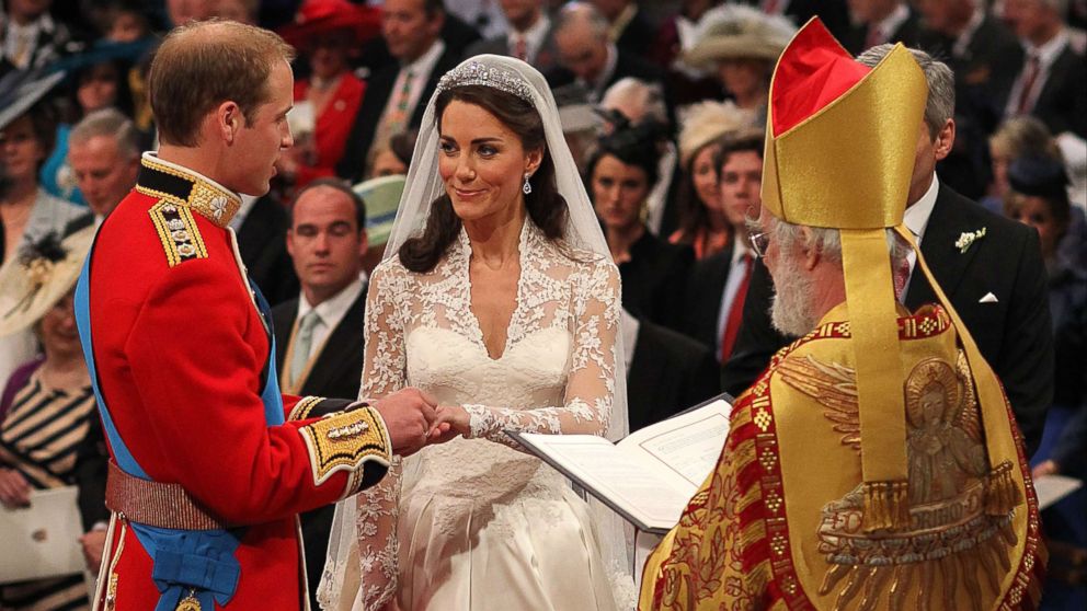 PHOTO: Britain's Prince William and Kate Middleton exchange rings in front of the Archbishop of Canterbury at Westminster Abbey, London, April 29, 2011.