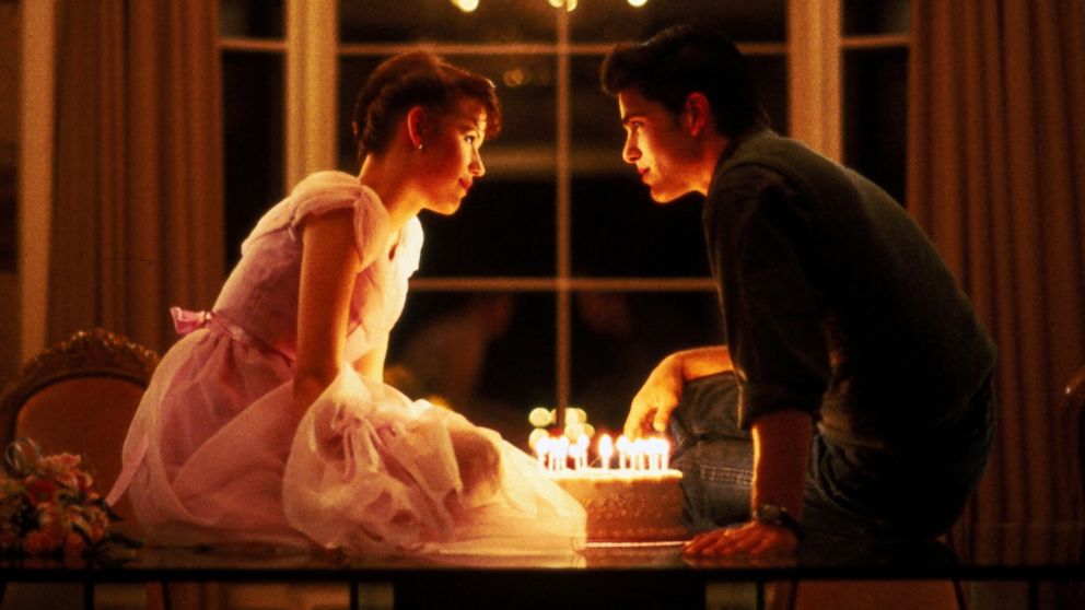 Molly Ringwald, left, and Michael Schoeffling are shown in a scene from "Sixteen Cancles" in this 1984 film publicity image released by Universal Pictures.