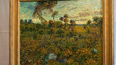 PHOTO: Van Gogh Museum director Axel Ruger looks at "Sunset at Montmajour"