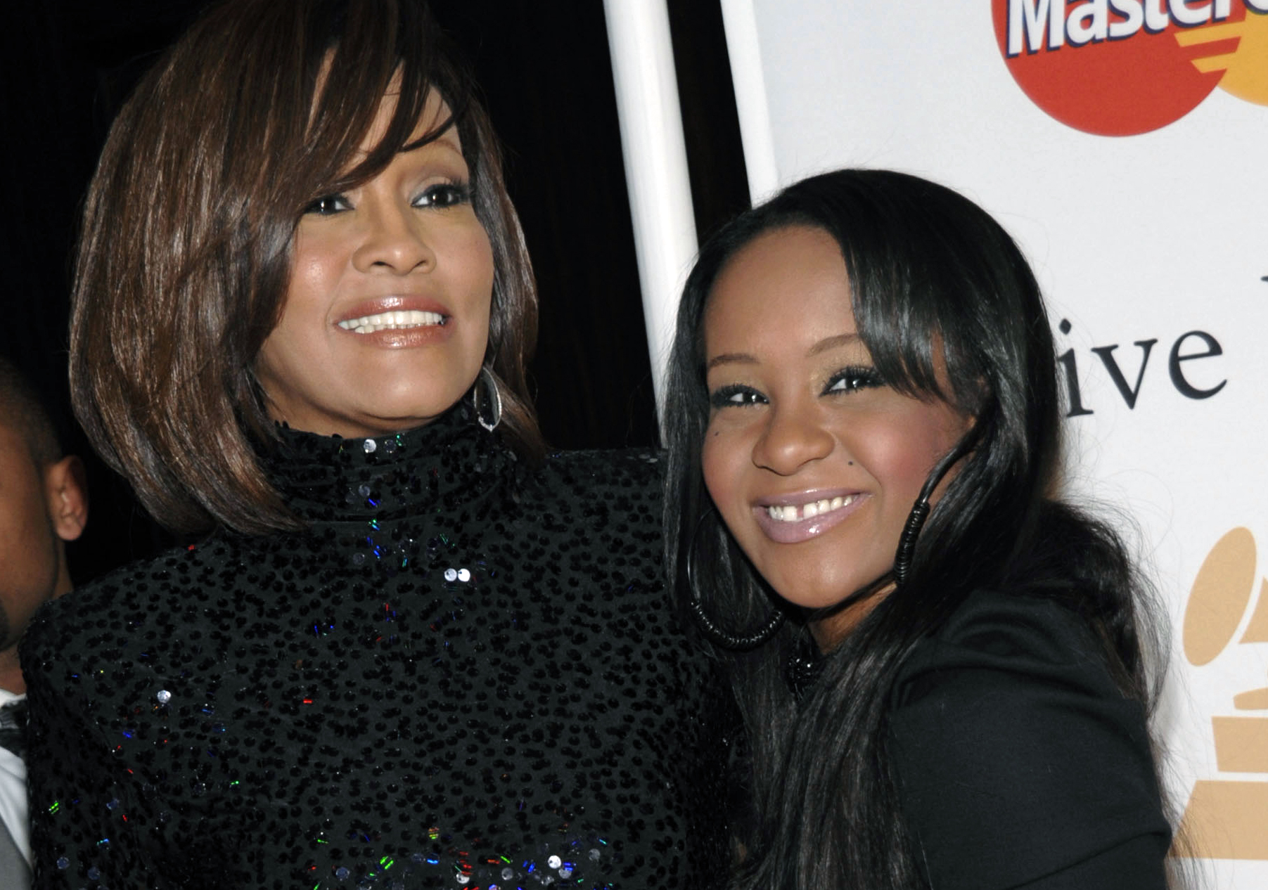 PHOTO: Singer Whitney Houston, left, and daughter Bobbi Kristina Brown arrive at an event in Beverly Hills, Calif., Feb. 12, 2011.