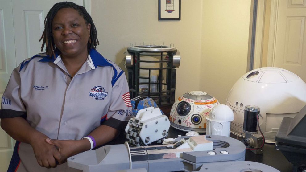 PHOTO: Christina Cato of the R2-D2 Builders Club with some of her droid works-in-progress.