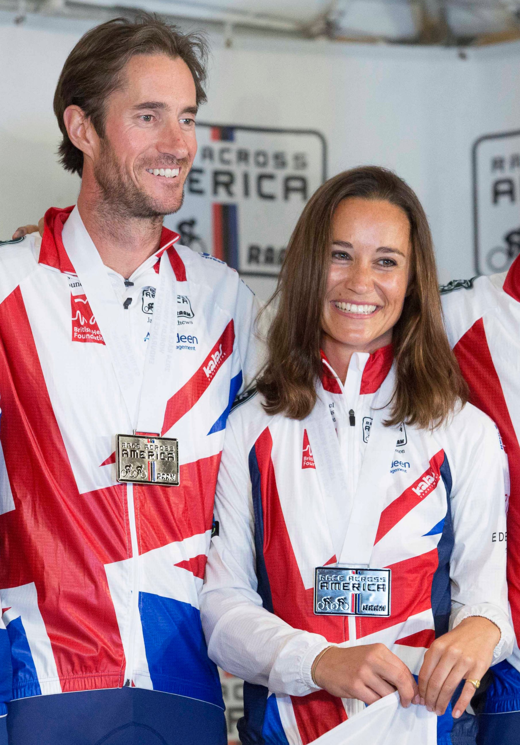 PHOTO: Pippa Middleton and James Matthews pose for photos after finishing their Race Across America bike race in Annapolis, Maryland, June, 21, 2014.