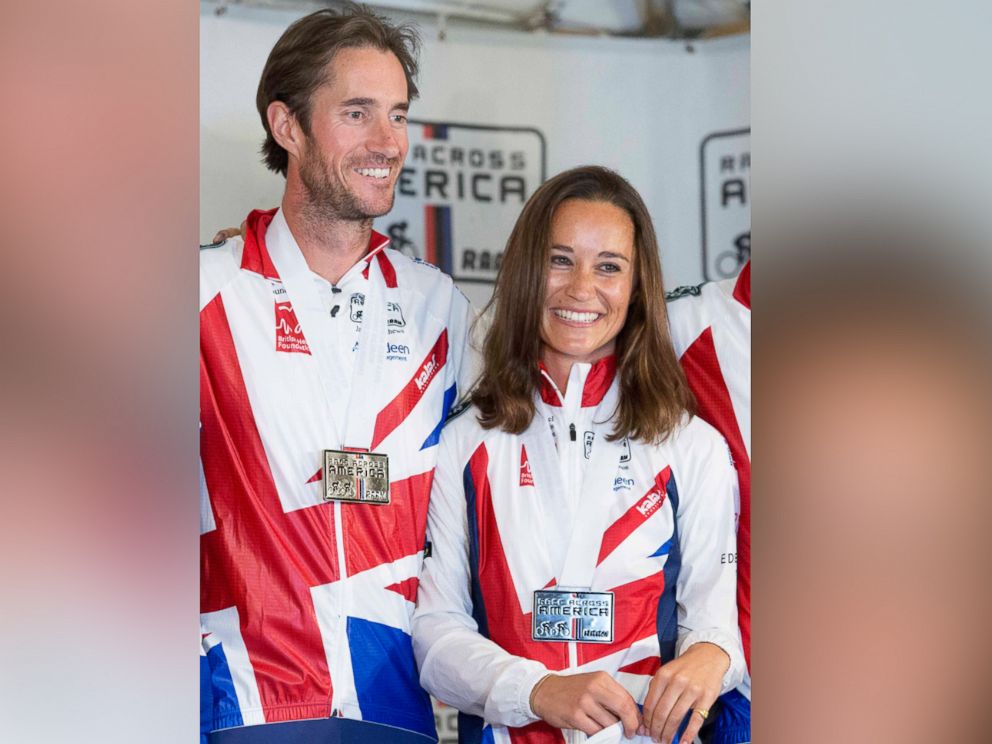 PHOTO: Pippa Middleton and James Matthews pose for photos after finishing their Race Across America bike race in Annapolis, Maryland, June, 21, 2014.