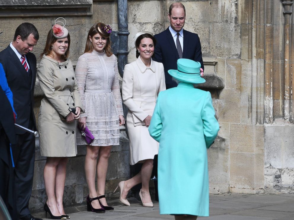 PHOTO: Catherine, The Duchess of Cambridge (2-R) performs a curtsy as The Queen, Elizabeth II (front) arrives for the Easter Service at St. George's Chapel in Windsor, England, April 16, 2017.