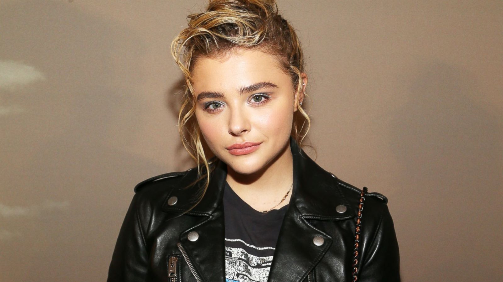 Chloe Grace Moretz shows off legs in shorts then covers up in