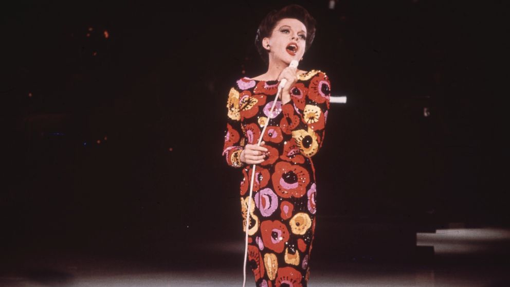 Singer and film star, Judy Garland performing on stage, circa 1960.  