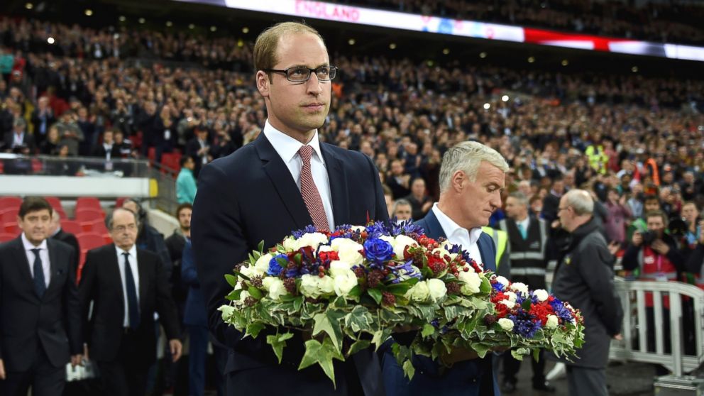 PHOTO: Prince William, The Duke of Cambridge holds the floral tribute during the International Friendly match between England and France at Wembley Stadium, on Nov. 17, 2015, in London.