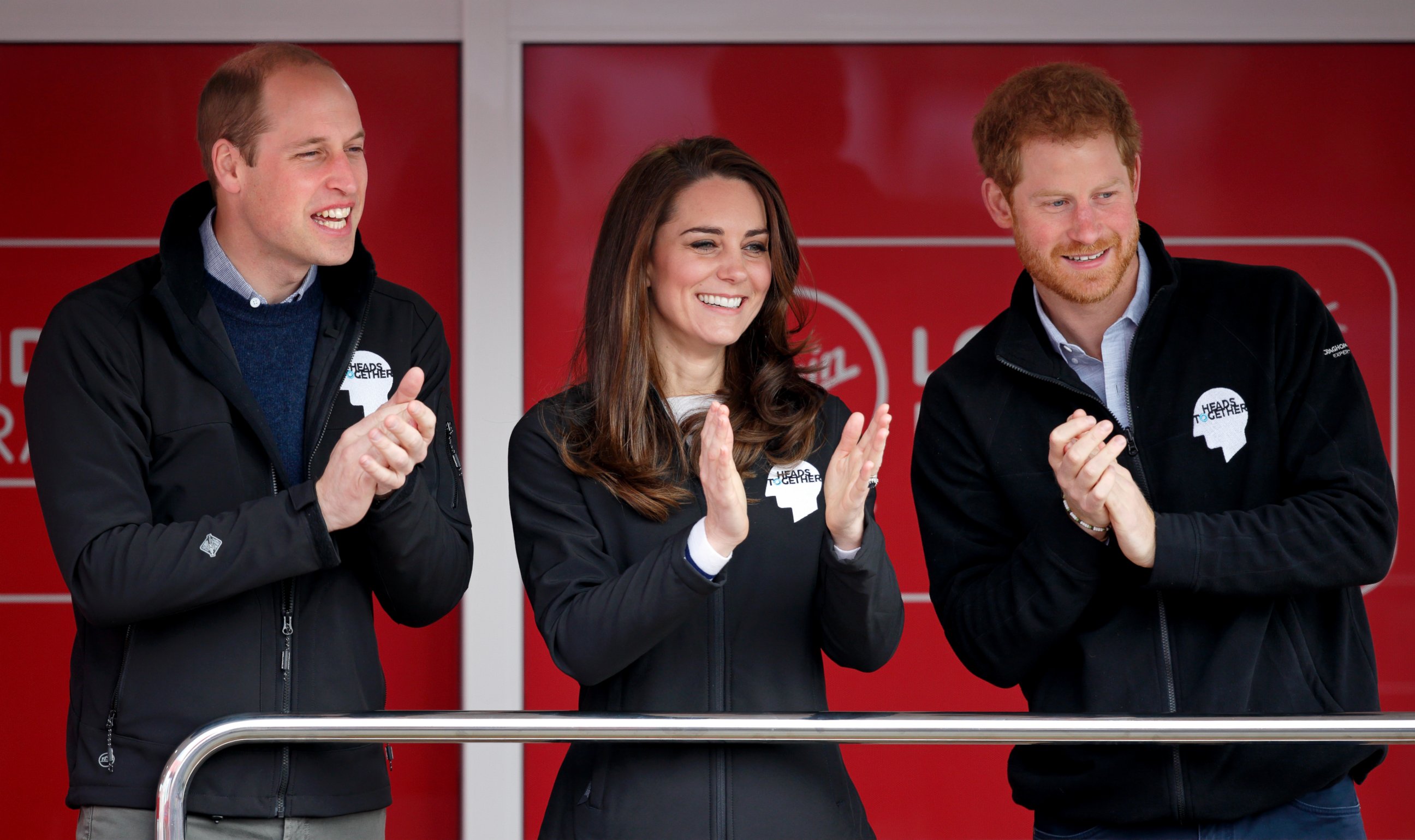 PHOTO: Prince William, Duke of Cambridge, Catherine, Duchess of Cambridge and Prince Harry cheer on runners as they start the 2017 Virgin Money London Marathon, on April 23, 2017, in London. 