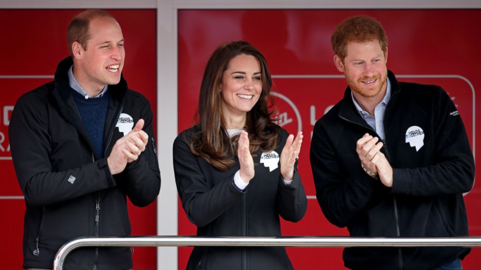 Prince William, Duke of Cambridge, Catherine, Duchess of Cambridge and Prince Harry cheer on runners as they start the 2017 Virgin Money London Marathon, on April 23, 2017, in London.