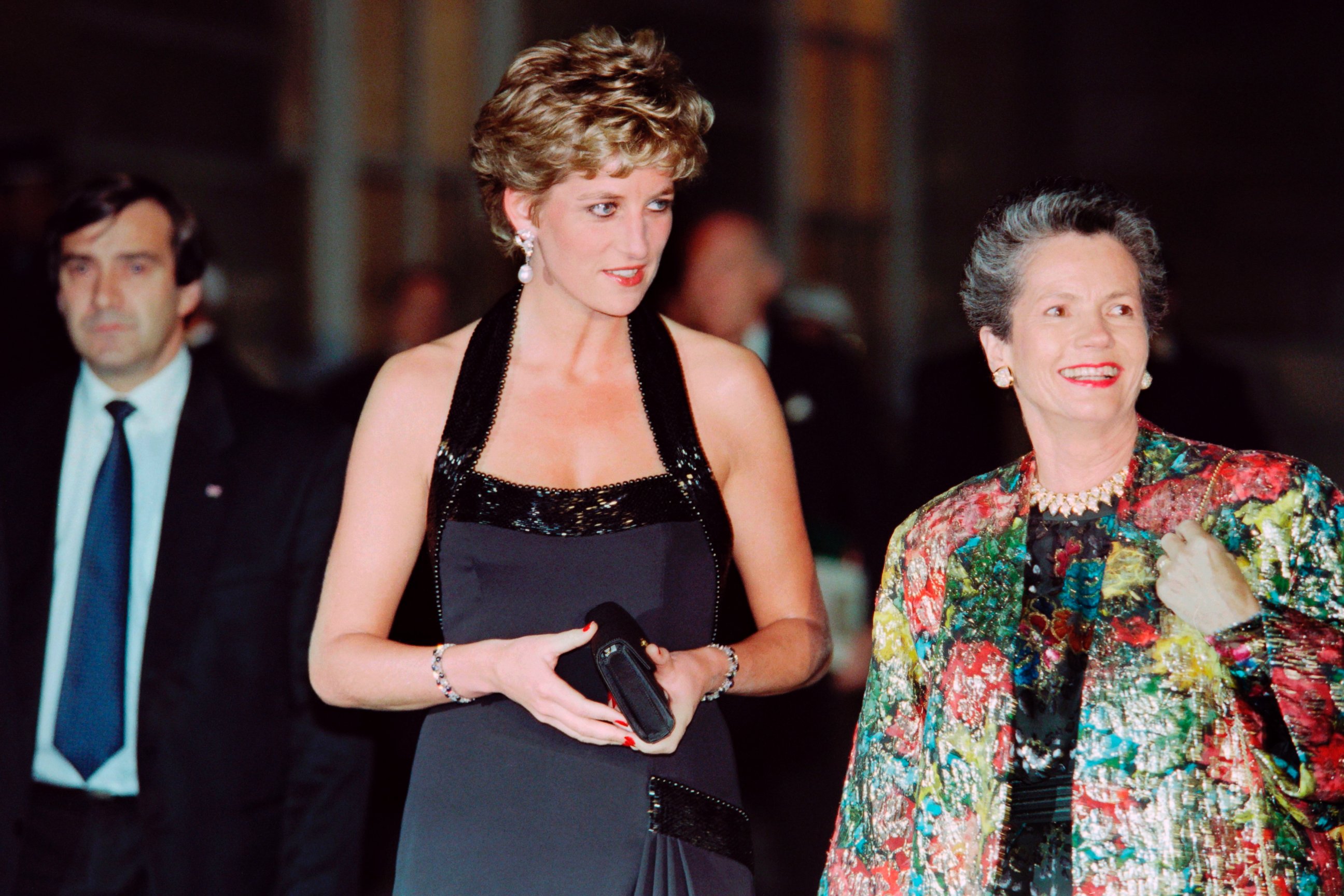 PHOTO: Britain's Princess Diana (L), accompanied by Anne-Aymone Giscard d'Estaing, president of the Children's Foundation, arrives at the Palace of Versailles, France, on Nov. 28, 1994, to preside an international gala for children.