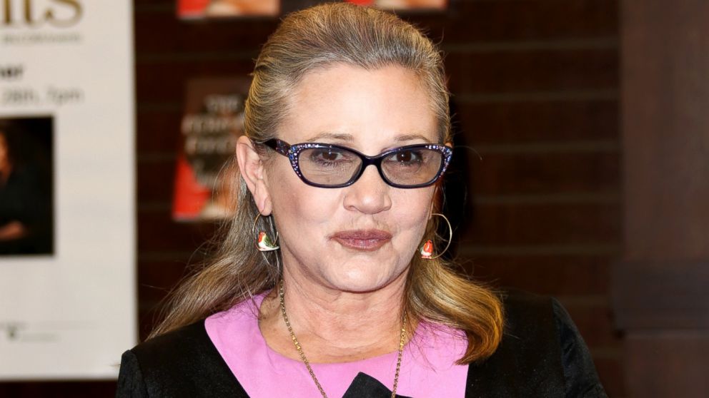 Carrie Fisher signs copies of her new book "The Princess Diarist" at Barnes & Noble at The Grove, Nov. 28, 2016, in Los Angeles, California.