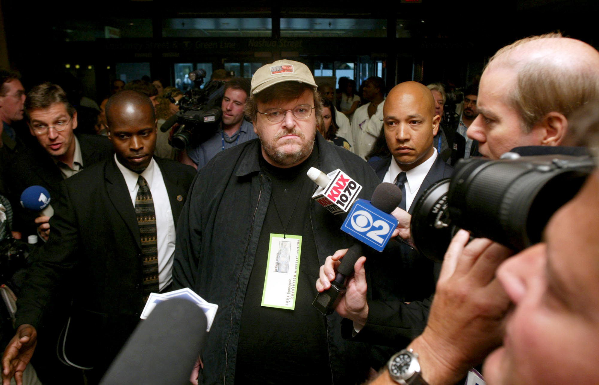 PHOTO: Michael Moore, director and producer of "Fahrenheit 9/11," navigates the media as he walks in the halls of the FleetCenter, the venue for the Democratic National Convention, in Boston, July 28, 2004.