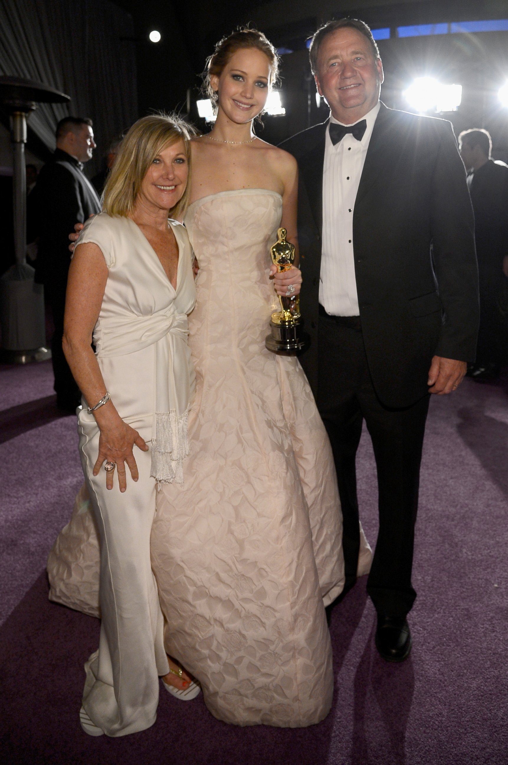 PHOTO: Jennifer Lawrence and her parents Karen Lawrence and Gary Lawrence at the Oscars Governors Ball, Feb. 24, 2013, in Hollywood, Calif.