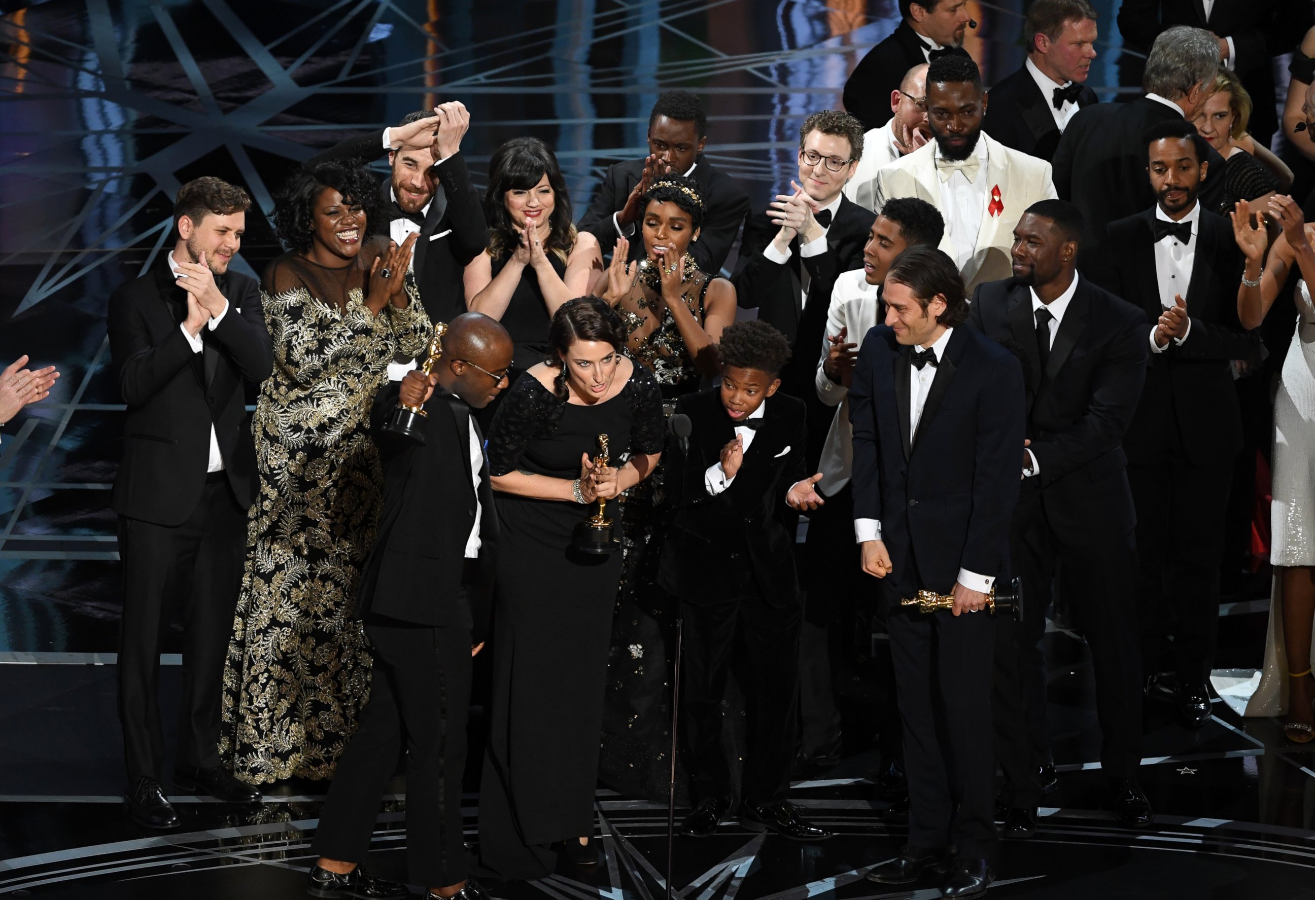 PHOTO: Cast and crew of "Moonlight" accept the Best Picture award onstage during the 89th Annual Academy Awards, Feb. 26, 2017, in Hollywood, Calif. 