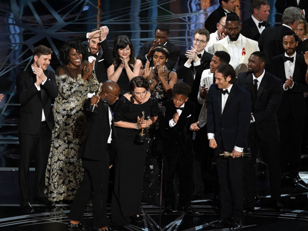PHOTO: Cast and crew of Moonlight accept the Best Picture award onstage during the 89th Annual Academy Awards, Feb. 26, 2017, in Hollywood, Calif.