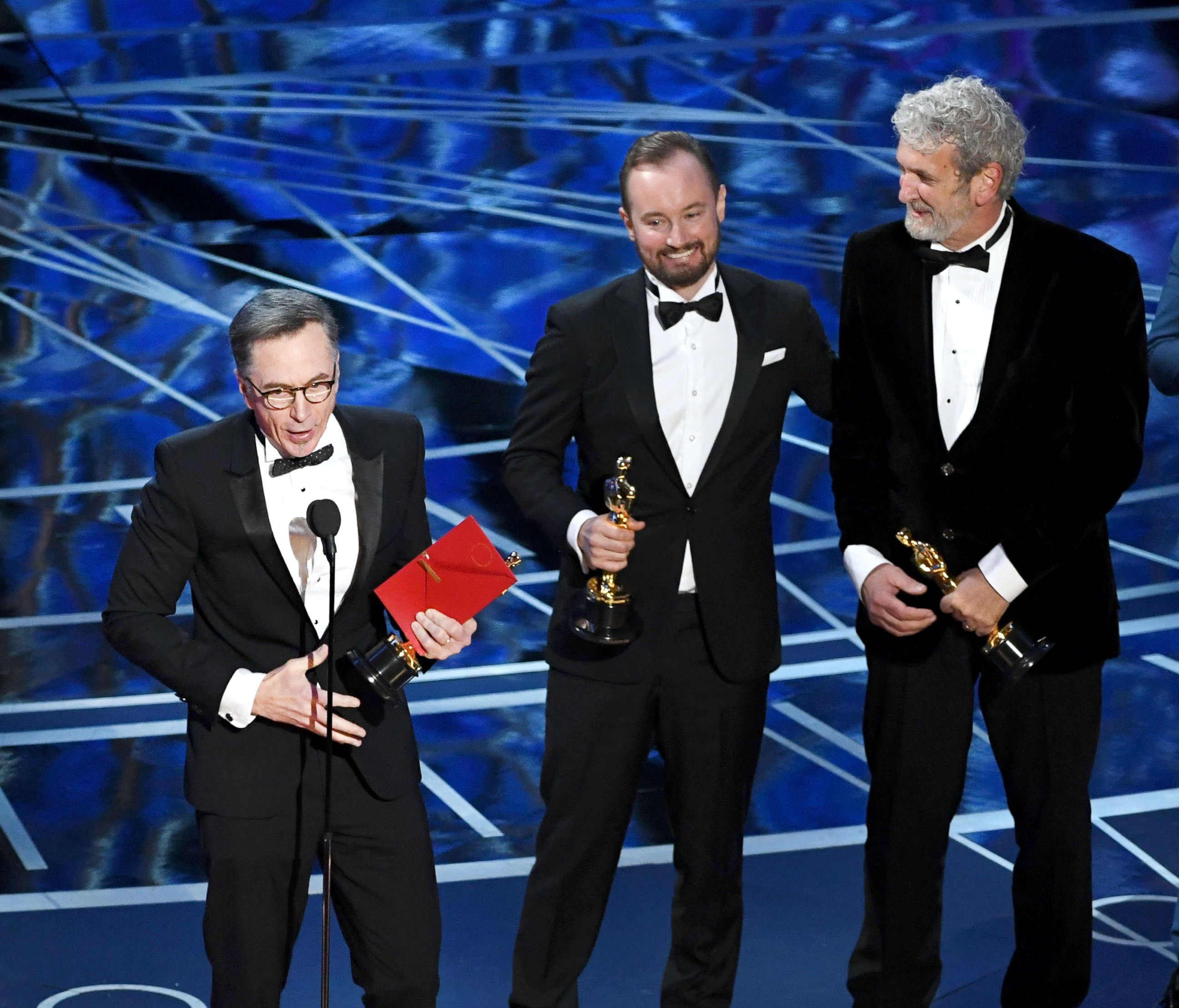 PHOTO: Sound re-recording mixer Kevin O'Connell, left,and sound engineera, from left, Andy Wright and Peter Grace accept Best Sound Mixing for 'Hacksaw Ridge' onstage during the 89th Annual Academy Awards, Feb. 26, 2017, in Hollywood, California. 