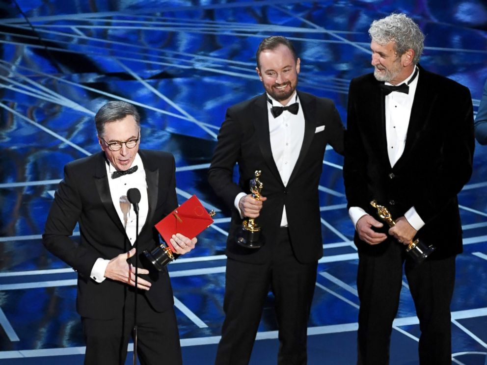 PHOTO: Sound re-recording mixer Kevin OConnell, left,and sound engineera, from left, Andy Wright and Peter Grace accept Best Sound Mixing for Hacksaw Ridge onstage during the 89th Annual Academy Awards, Feb. 26, 2017, in Hollywood, California.