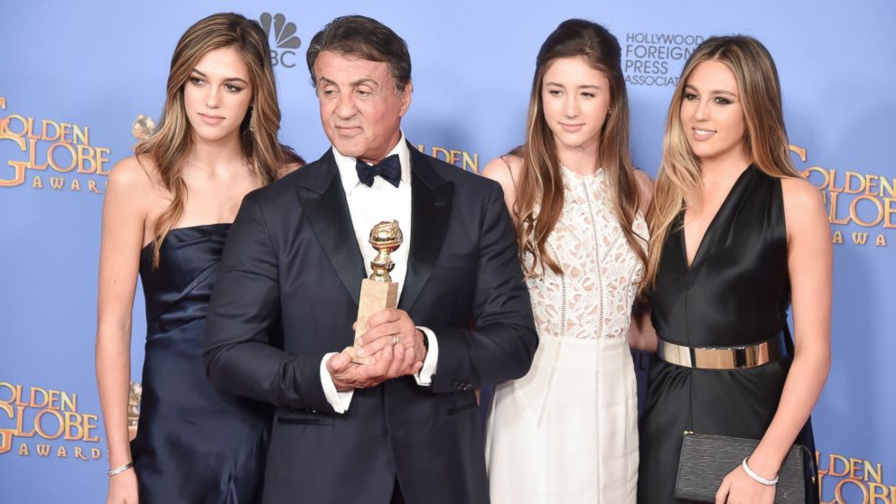 Sylvester Stallone poses in the press room with daughters Sistene, Sophia and Scarlet during the 73rd Annual Golden Globe Awards held at the Beverly Hilton Hotel, Jan. 10, 2016 in Beverly Hills, California.  