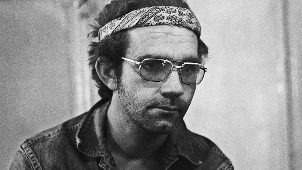 American musician JJ Cale posed backstage at the Carre Theatre, Amsterdam in 1974. 