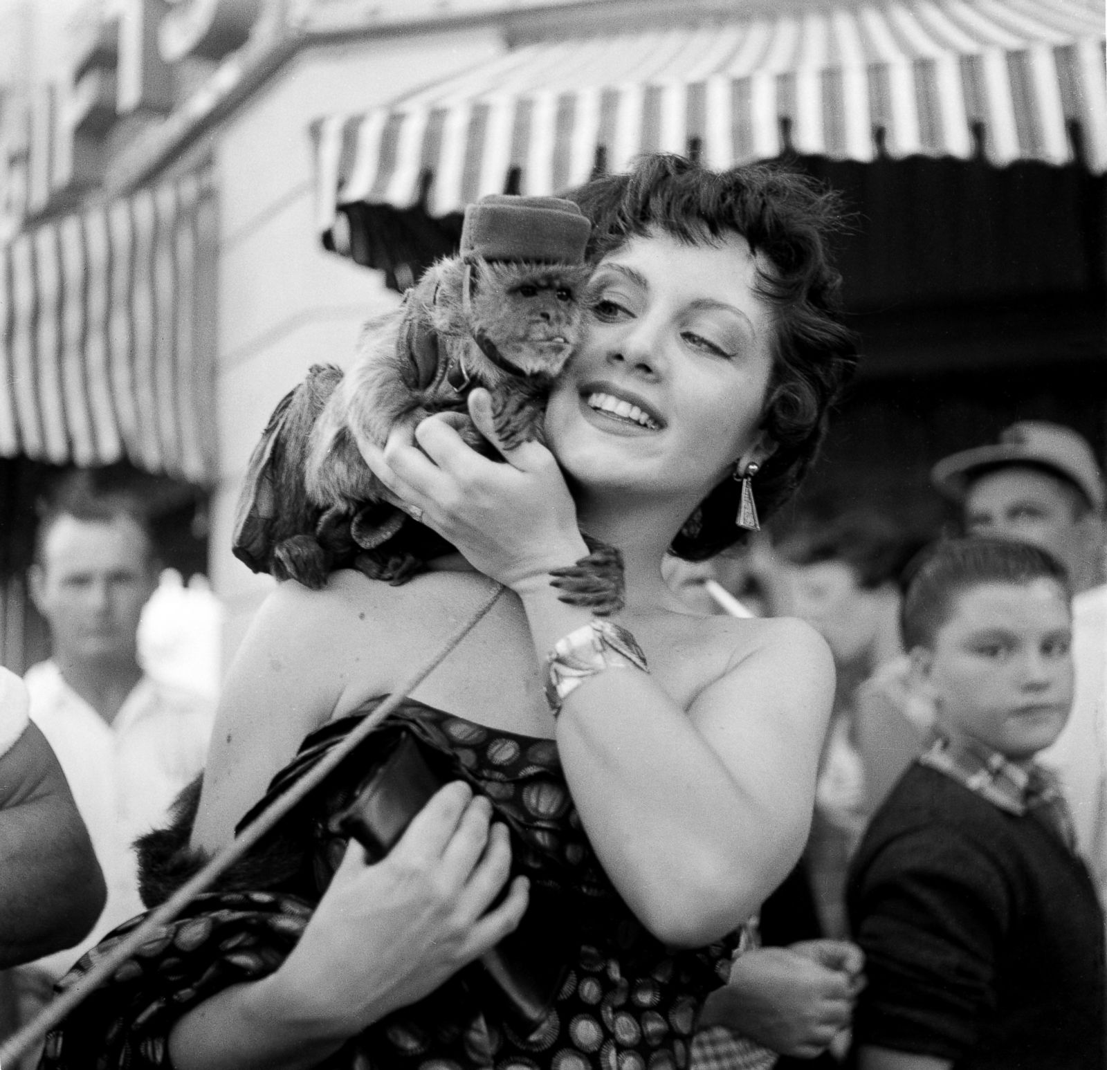 Actress Kathleen Case poses with a monkey during the opening day of Disneyl...