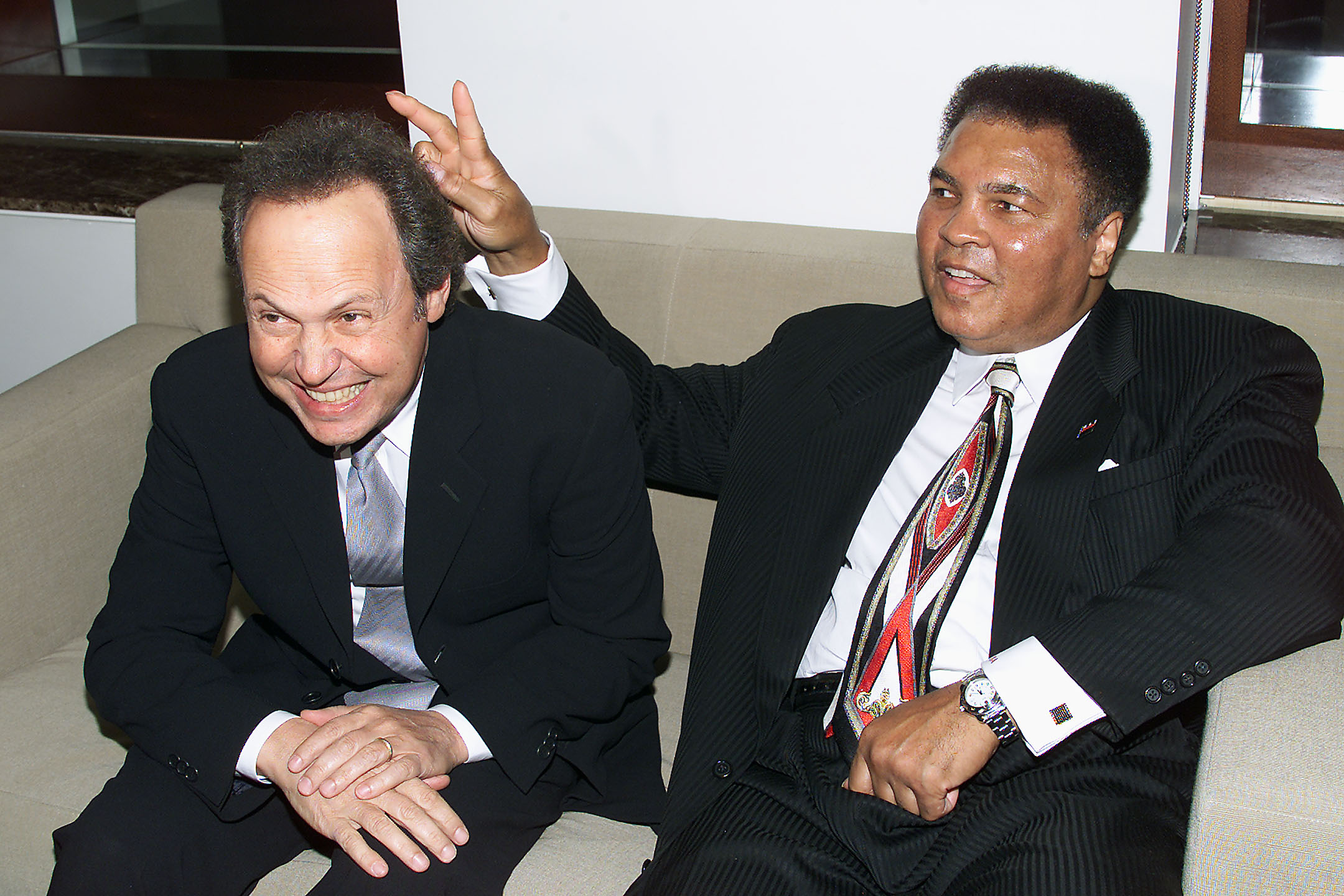 PHOTO: Billy Crystal & Muhammad Ali at Audemars Piguet's Time To Give Celebrity Watch Auction For Charity held at Christie's Auction House in New York on Oct. 23, 2000. 
