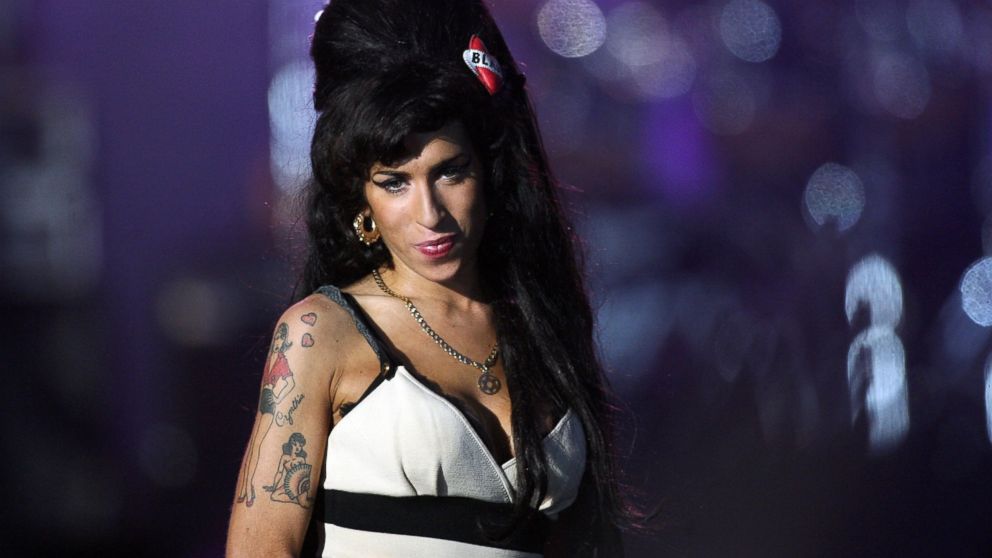 Amy Winehouse performs at  a 46664 AIDS charity concert in honor of Nelson Mandela's life at Hyde Park,  June 27, 2008, in London.