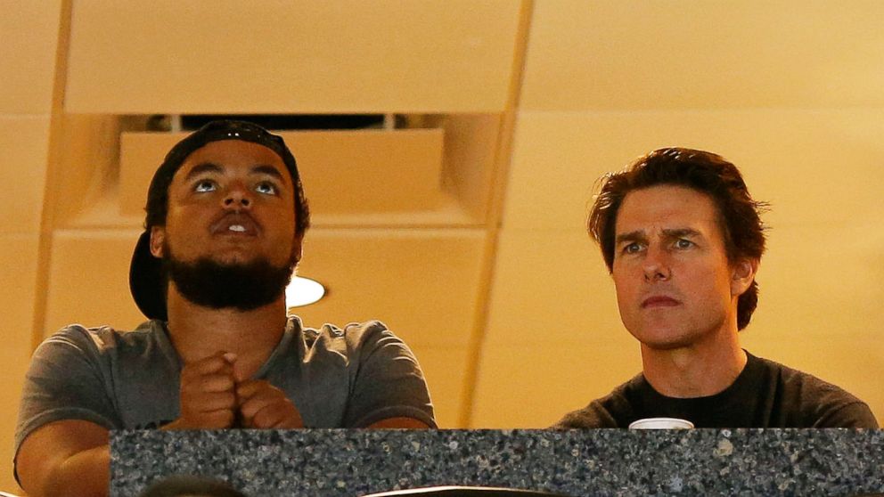 Actor Tom Cruise and his son Connor Cruise watch the Maryland Terrapins play against the Connecticut Huskies during the NCAA Women's Final Four Semifinal at Amalie Arena, April 5, 2015 in Tampa, Florida.
