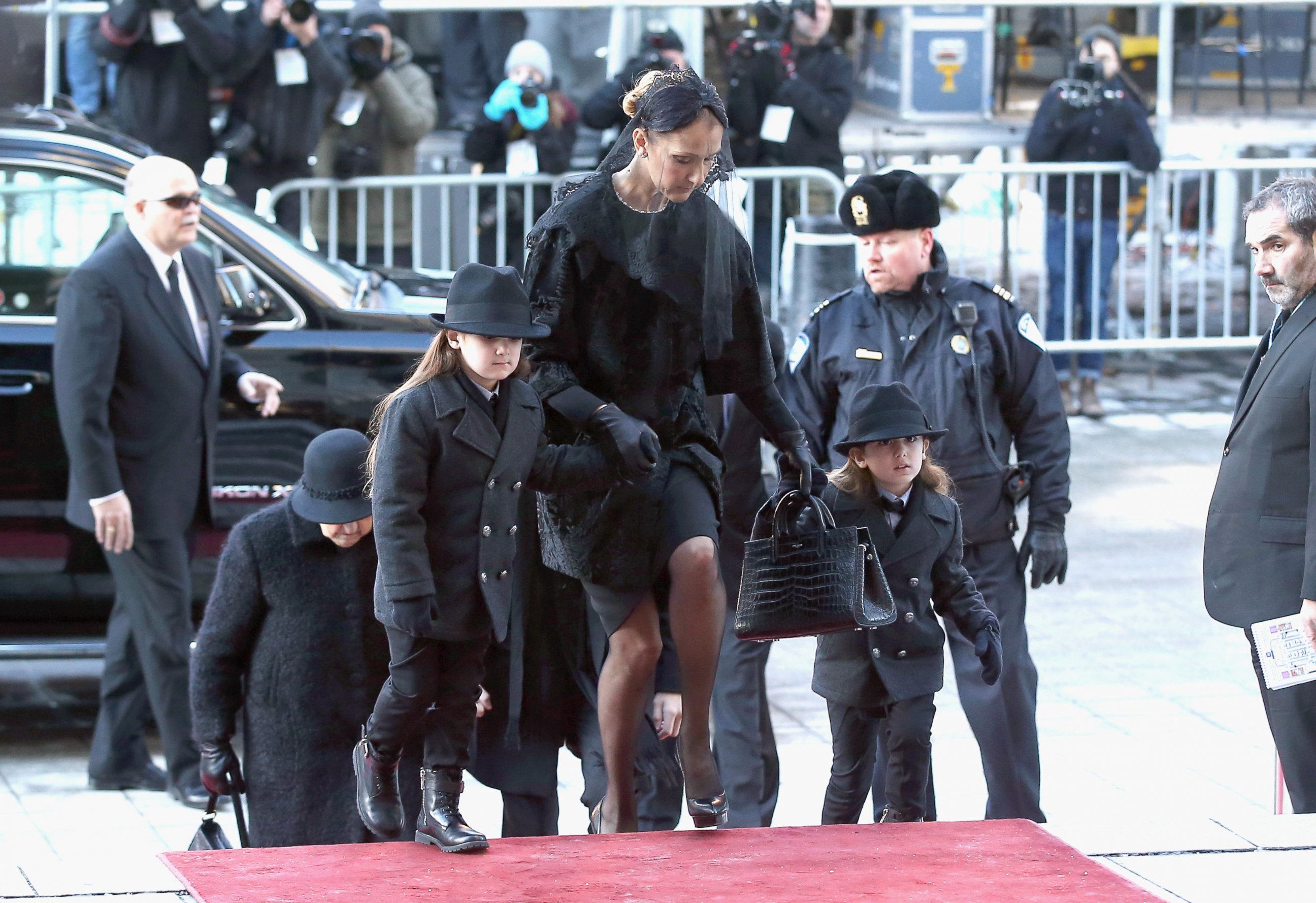 PHOTO: Celine Dion, with twin sons Nelson and Eddy arrive for the State Funeral Service for her husband, Rene Angelil at Notre-Dame Basilica on Jan. 22, 2016 in Montreal, Canada. 