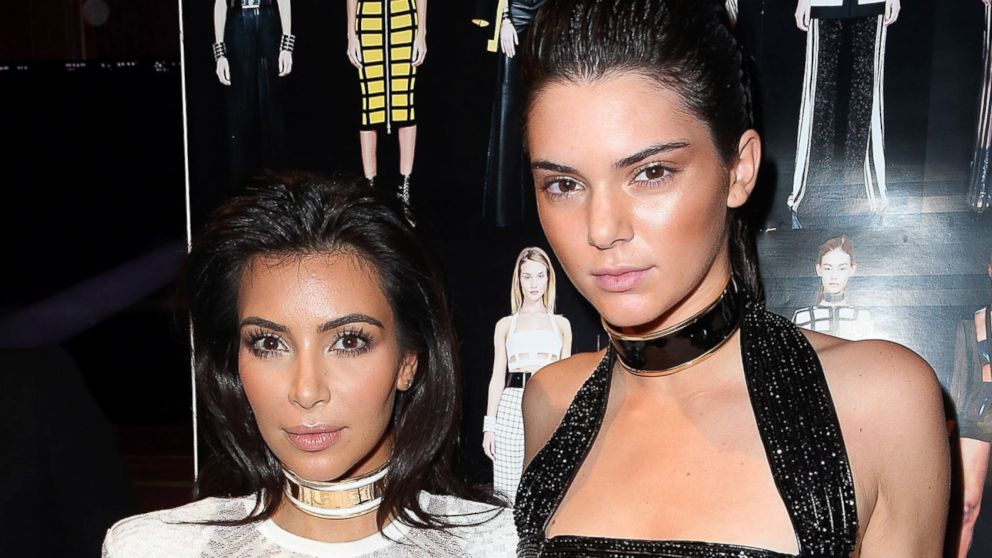 Kendall Jenner (R) and Kim Kardashian pose in Backstage after the Balmain show as part of the Paris Fashion Week Womenswear Spring/Summer 2015 on Sept. 25, 2014 in Paris.