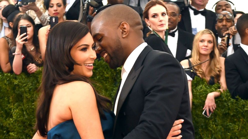 Kanye West and Kim Kardashian arrive at the Costume Institute Benefit at The Metropolitan Museum of Art May 5, 2014 in New York.