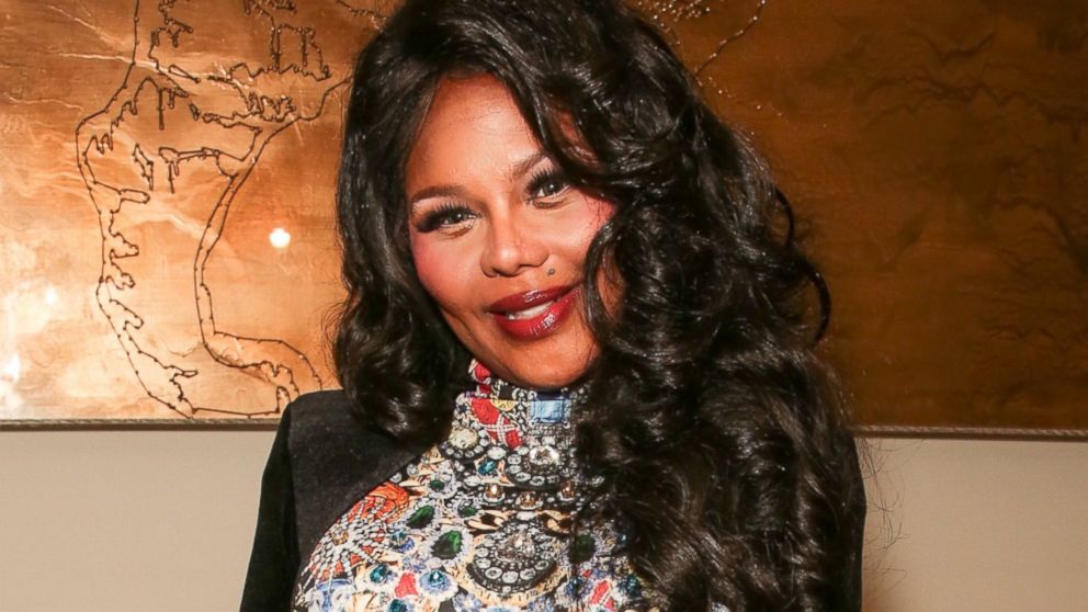 Rapper Lil' Kim backstage at the The Blonds fashion show during MADE Fashion Week Fall 2014 at Milk Studios on February 12, 2014 in New York City.