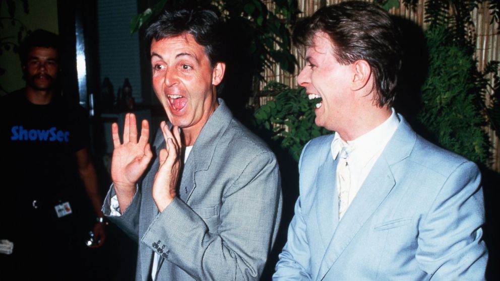 Musician's Paul McCartney and David Bowie are seen backstage at Live Aid in this July 13, 1985 file photo.