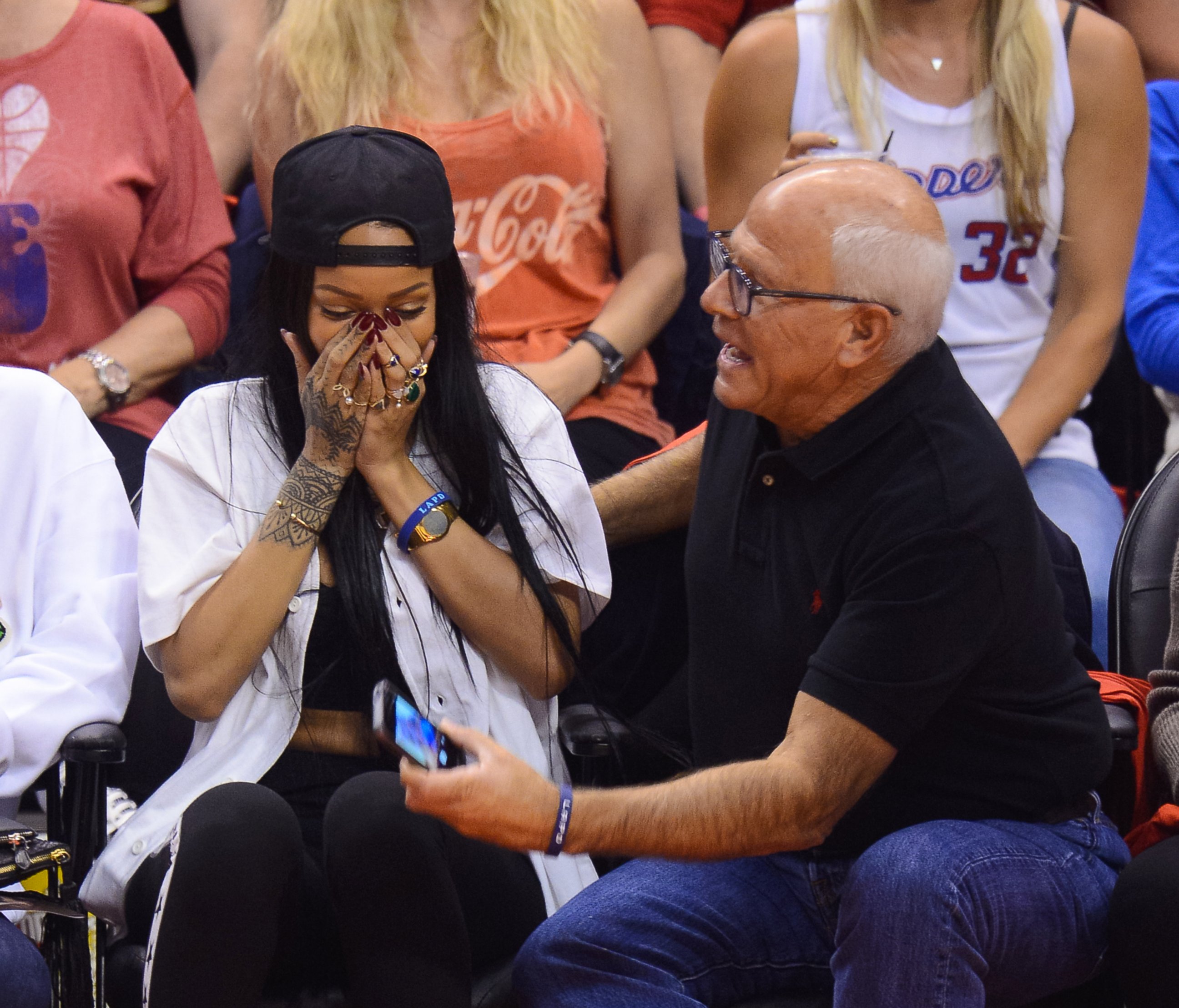 PHOTO: Rihanna attends an NBA playoff game between the Oklahoma City Thunder and the Los Angeles Clippers on May 9, 201.  