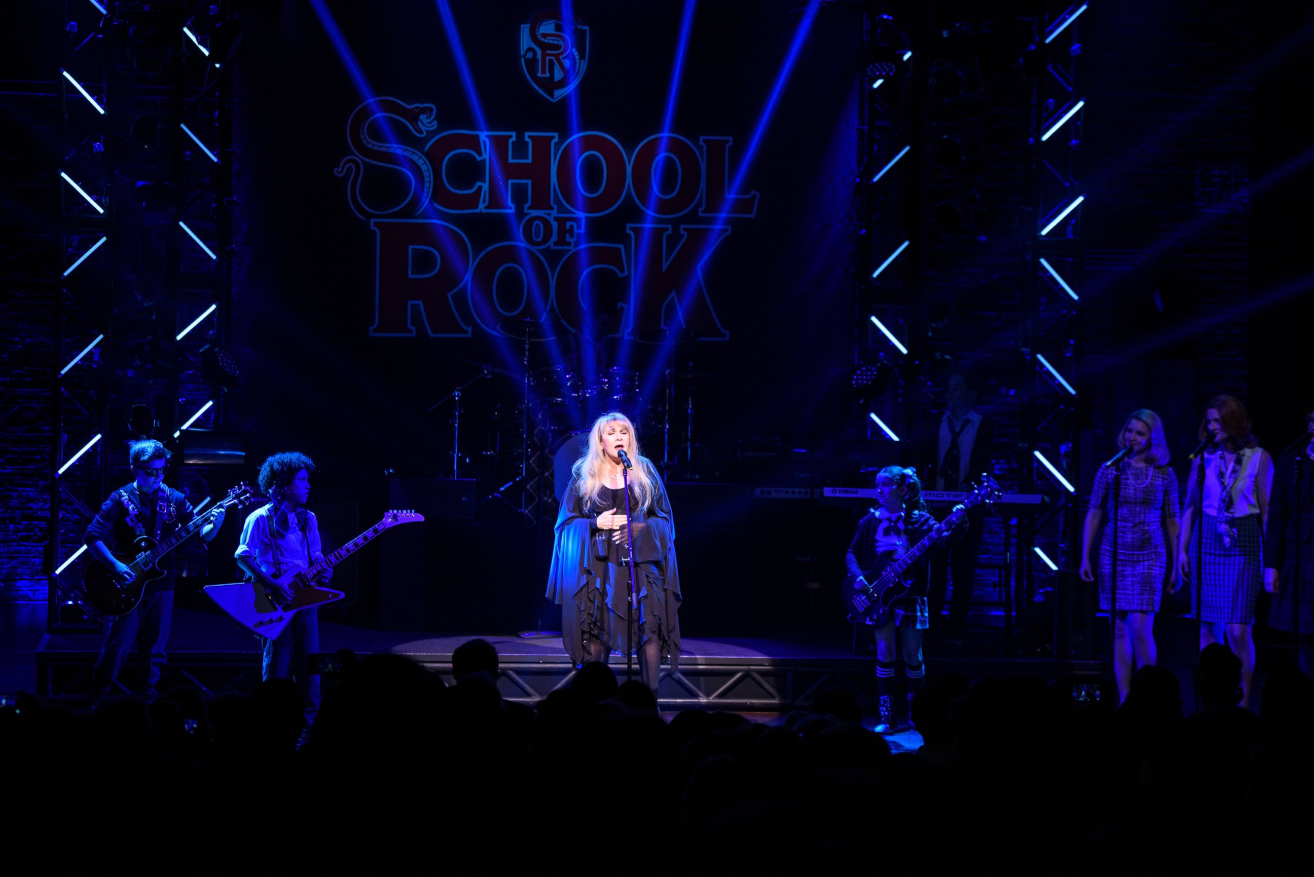 PHOTO: Stevie Nicks of the band Fleetwood Mac performs live on stage with the cast of "School of Rock - The Musical" at the Winter Garden Theatre on April 26, 2016 in New York City. 