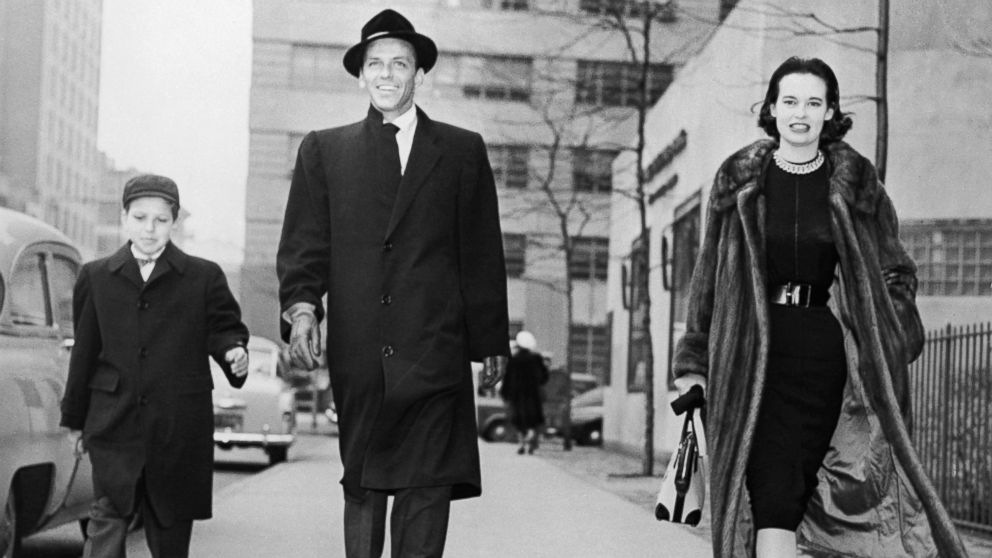 PHOTO: Gloria Vanderbilt Stokowska strolling with actor-singer Frank Sinatra and the latter's son, Frank, Jr., on New York's First Avenue, Dec. 31, 1954.