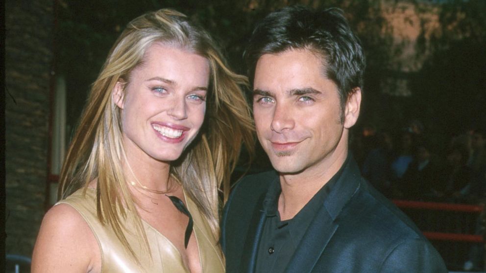 John Stamos and Rebecca Romijn-Stamos during "Austin Powers: The Spy Who Shagged Me" - Los Angeles Premiere at Universal Amphitheatre on June 8, 1999 in Universal City, Calif.