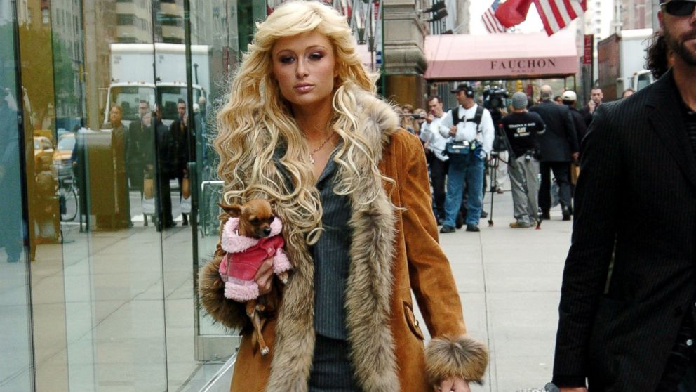 Paris Hilton and Tinkerbell are seen filming a scene for the TV series, "The Simple Life."
