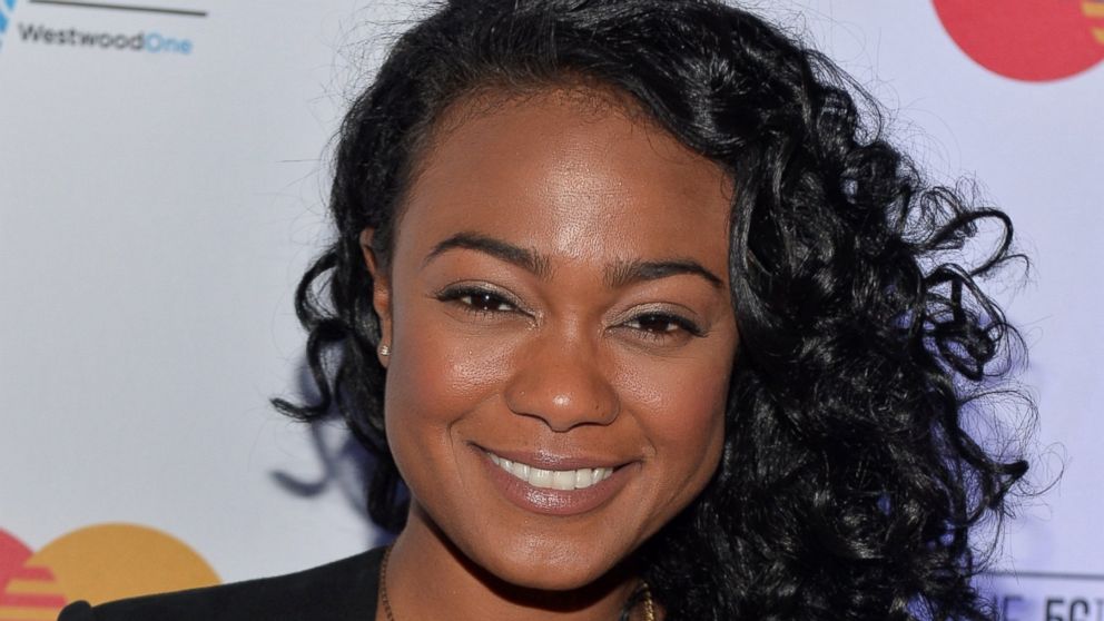 Actress Tatyana Ali is engaged to Vaughn Rasberry and they are also expecting their first child together. She is shown here on January 24, 2014 in Los Angeles, California. 