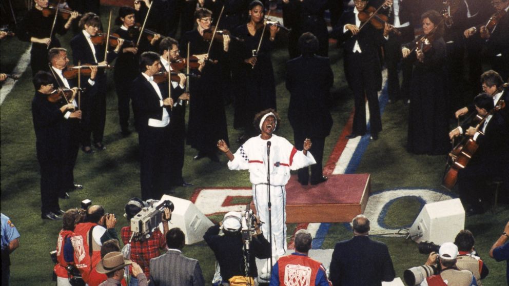 PHOTO: Whitney Houston sings the National Anthem before the New York Giants took on the Buffalo Bills in Super Bowl XXV at Tampa Stadium on Jan. 27, 1991 in Tampa, Fla. 