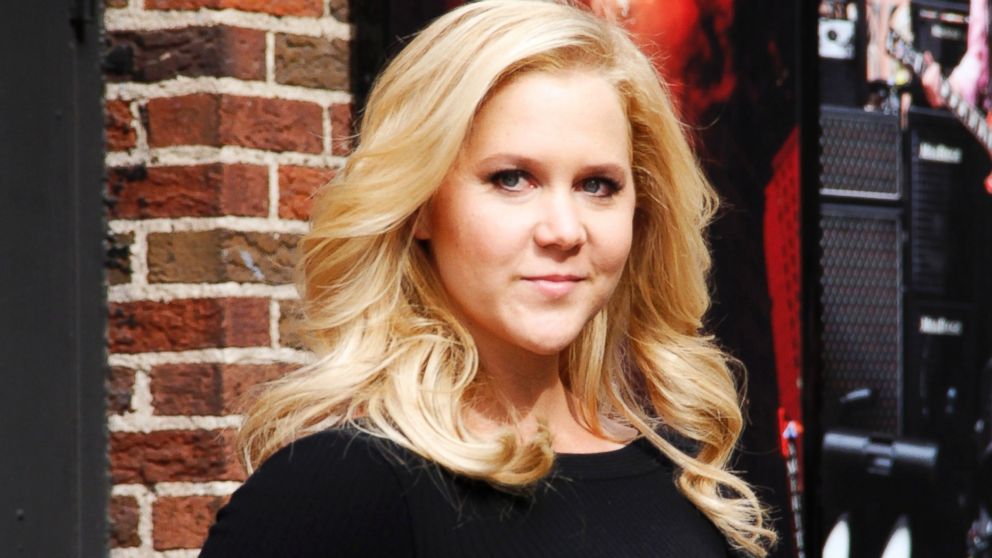 Amy Schumer arrives for the "Late Show with David Letterman" at the Ed Sullivan Theater, April 1, 2014 in New York.